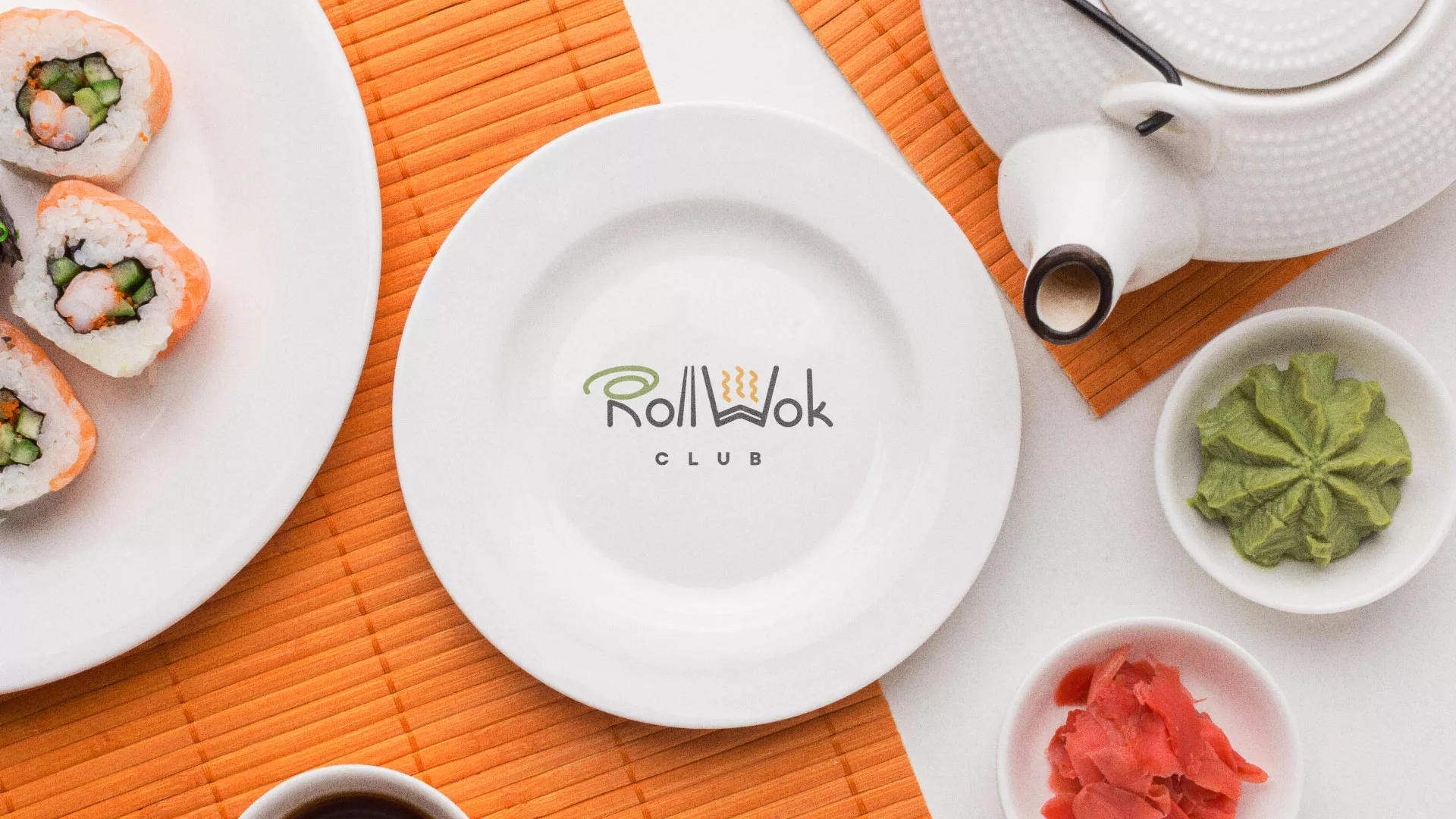 Разработка логотипа и фирменного стиля в Орске для суши-бара «Roll Wok Club» Разработка логотипа и фирменного стиля в Орске для суши-бара «Roll Wok Club»